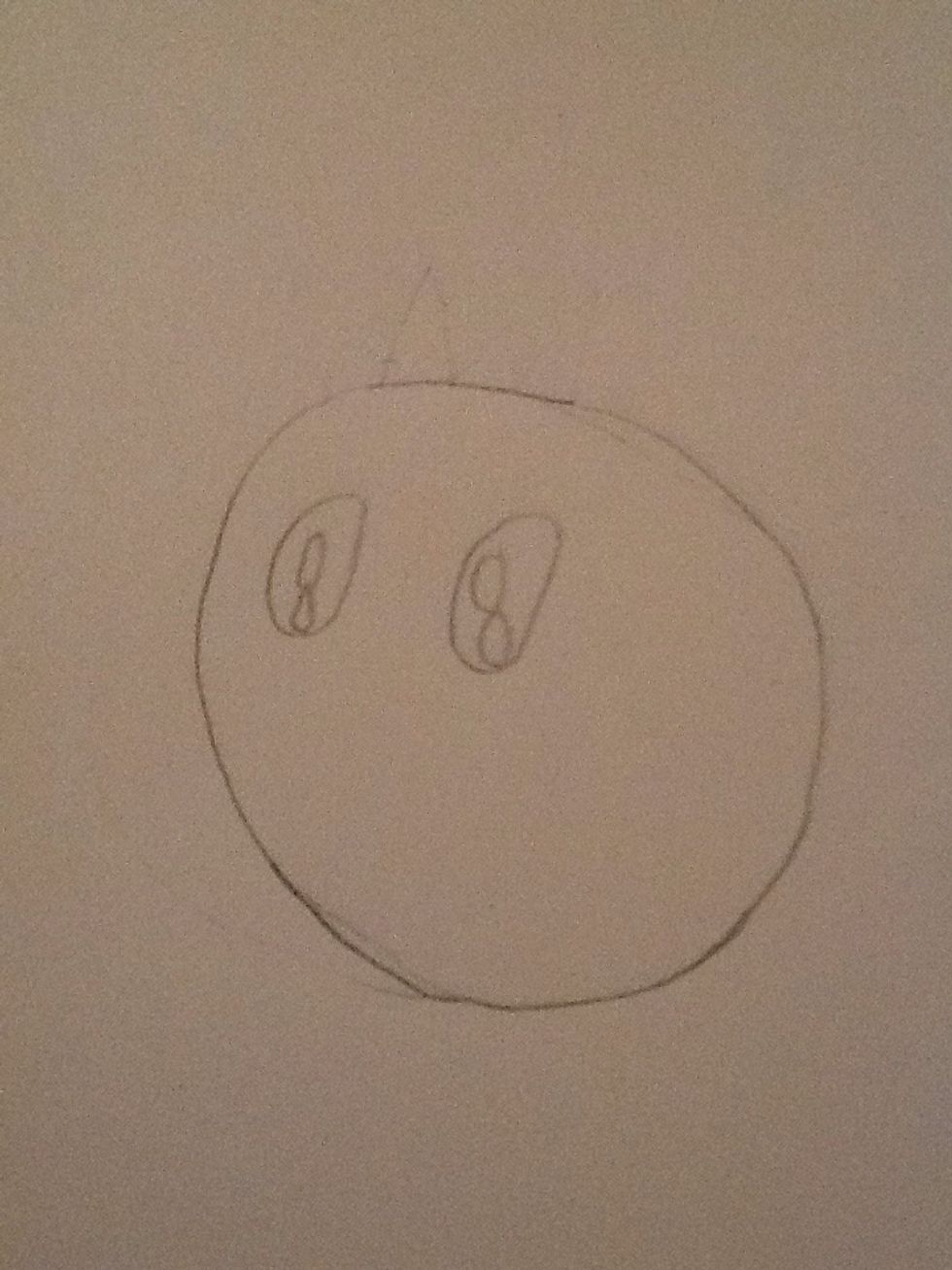 Then draw 2 circles next you draw a pupil