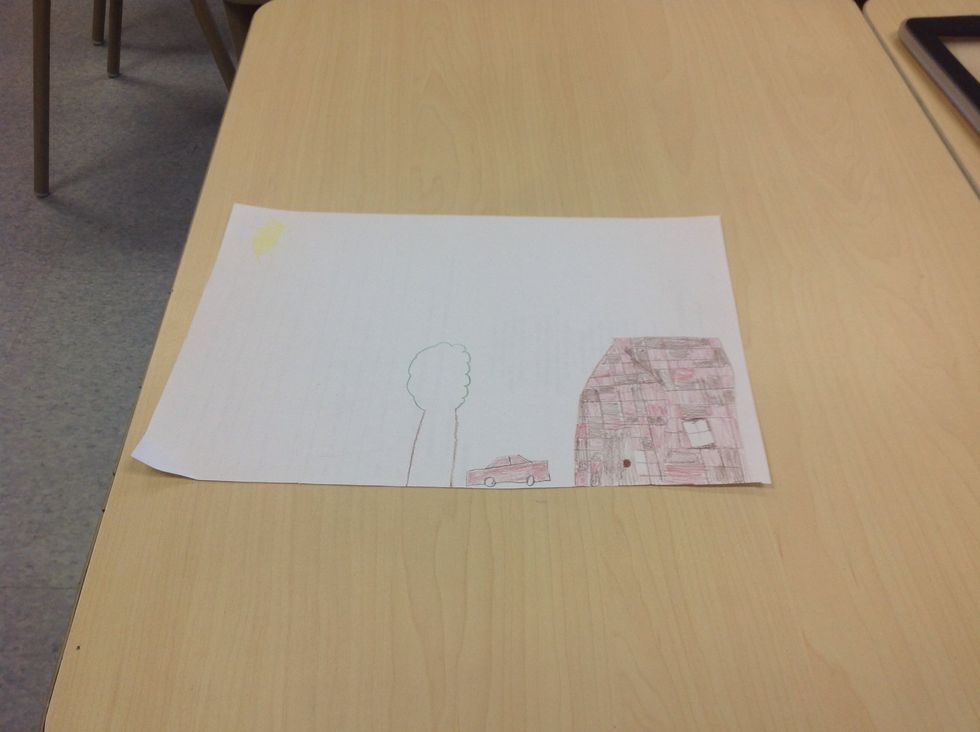 Then draw a car beside the house and colour it red.Colour the windows red.