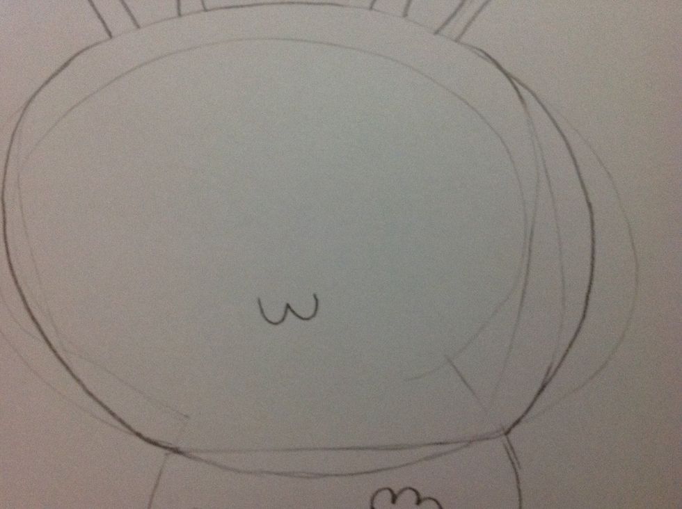 Then draw a little lowercase w for the mouth.