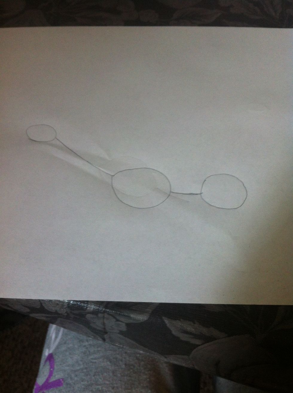 Then draw a sketch of the body put 2 circles ( the first one big then the second one slightly smaller) this is what it should look like ( remember to connect the neck to the body )