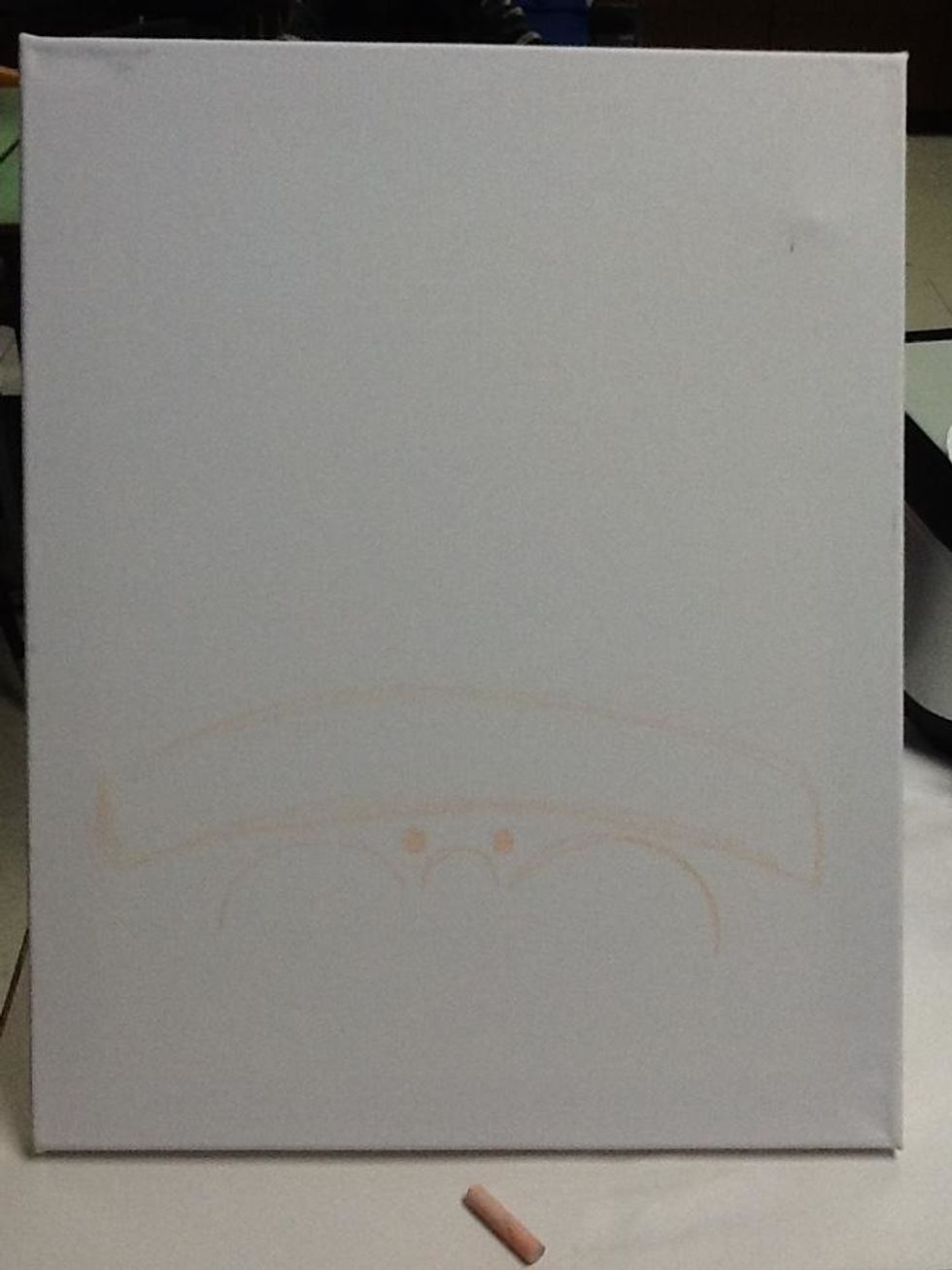 Then draw a small curve in the center for a nose with two larger curves on each side for cheeks. Add two dots for eyes above the nose.