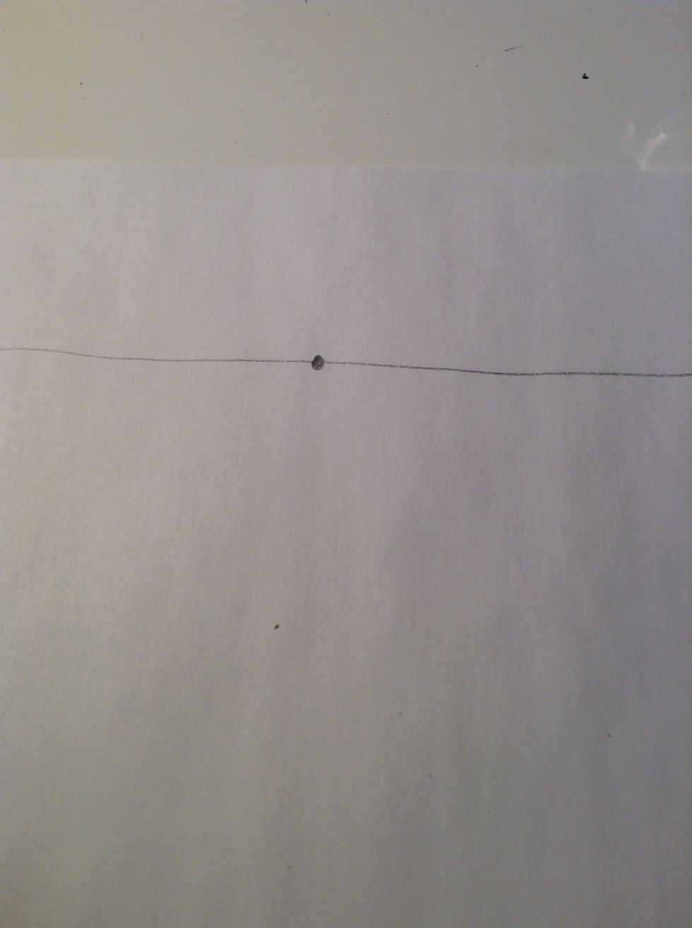 Then draw a tiny circle in the middle of the line