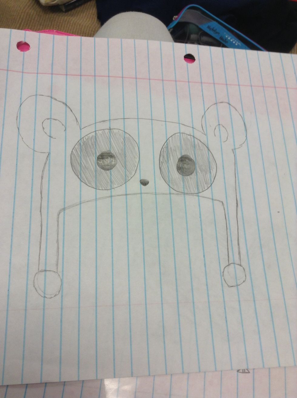 Then draw an upside down triangle for the nose