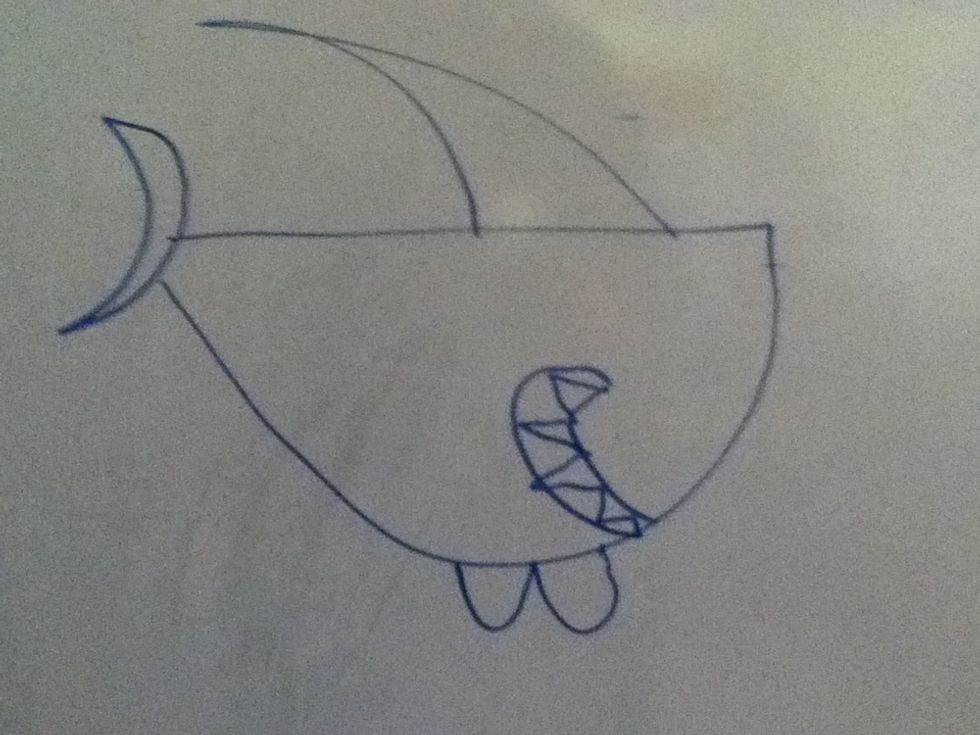 Then, draw another crescent moon for a mouth, and a triangular pattern for the teeth.