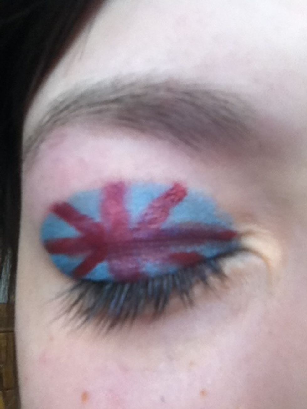 Then draw another four smaller red lines diagonally on your lid, to form an X shape.