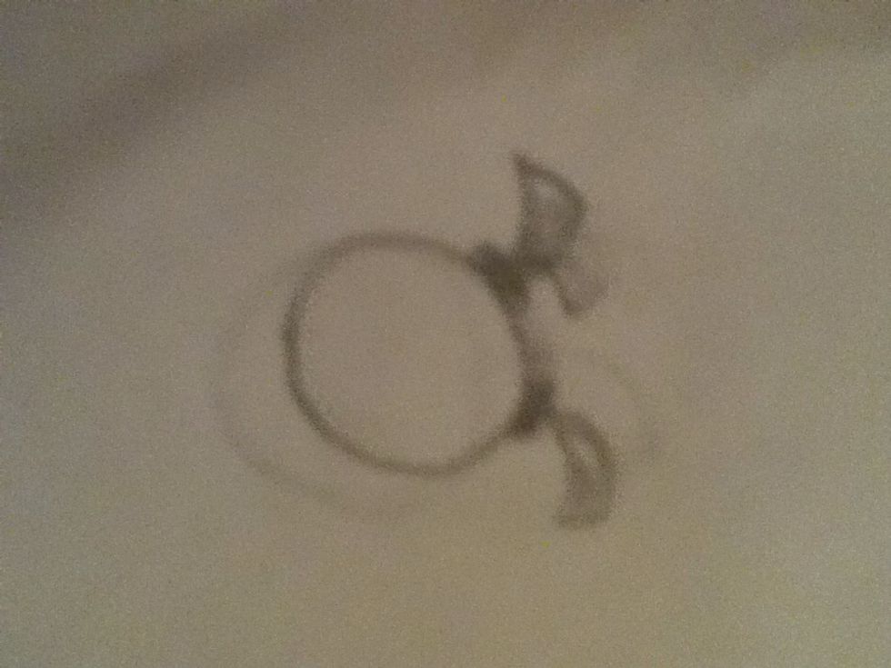 Then draw another pair of ponytail next to it