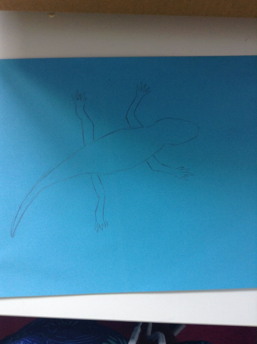 then draw to short arms up by the head and again do the same thing with the fingers now this should look more like a lizard