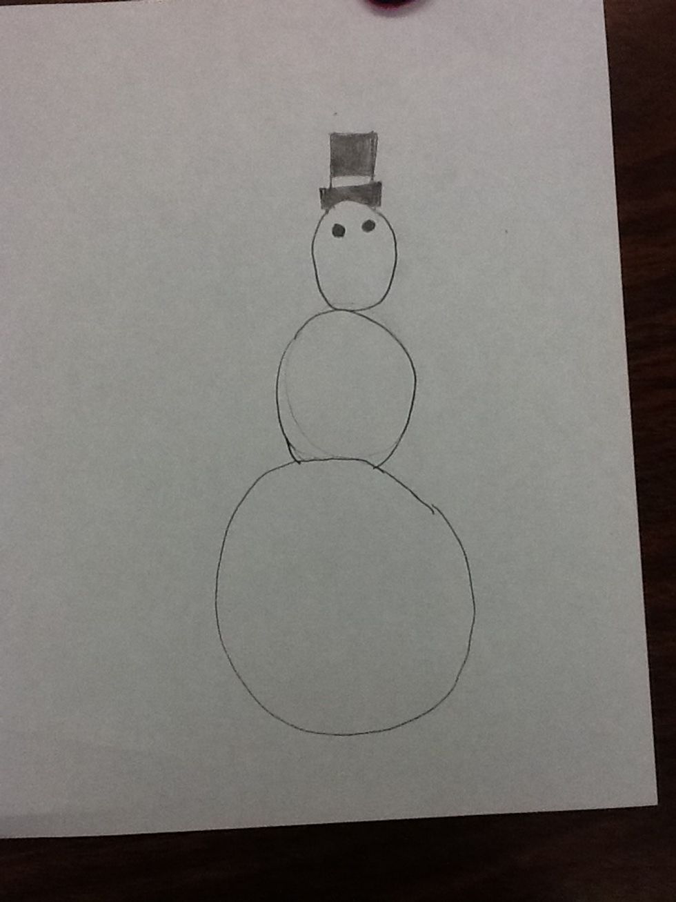 Then draw two black button eyes