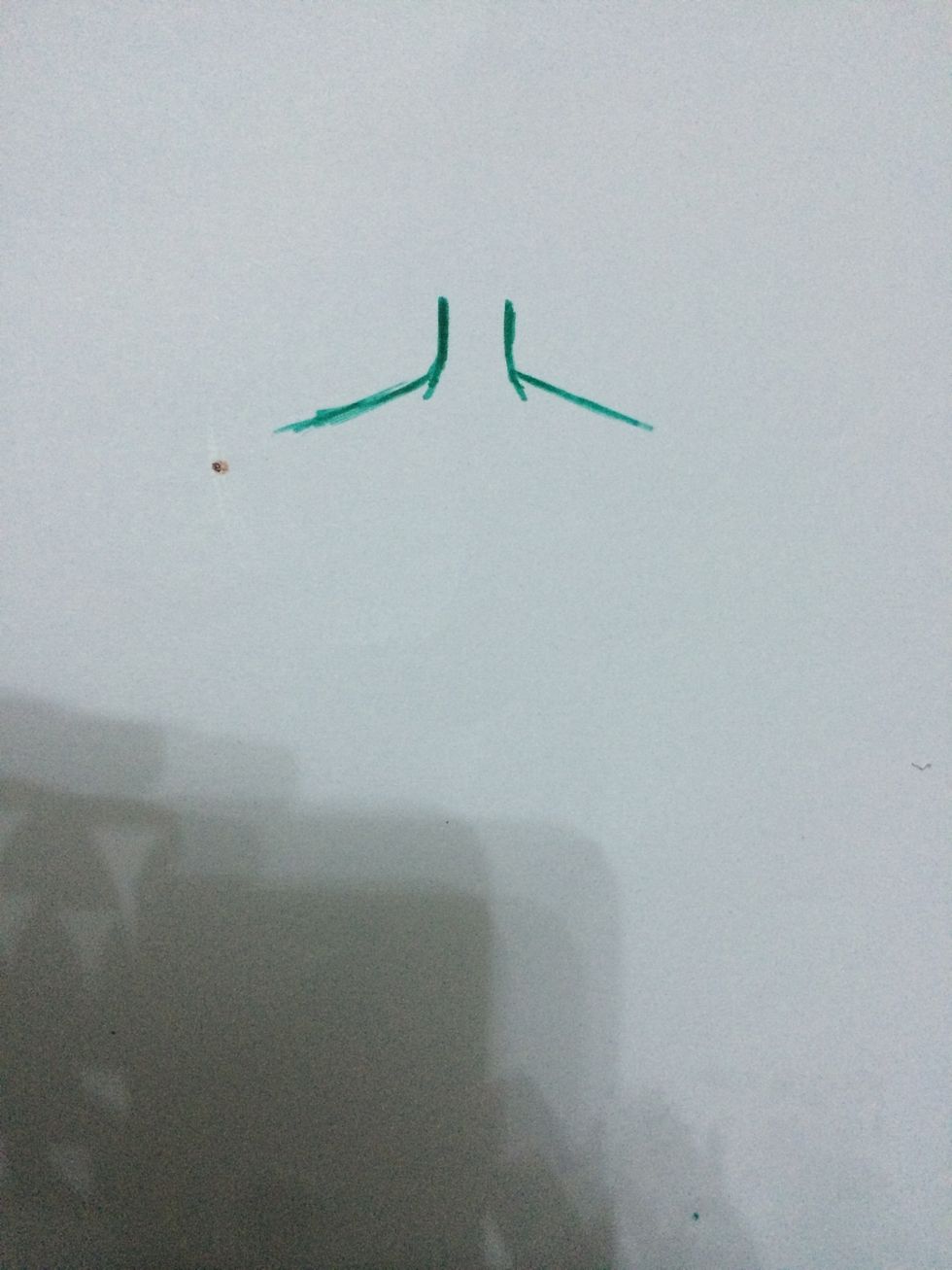 Then draw two lines by each side