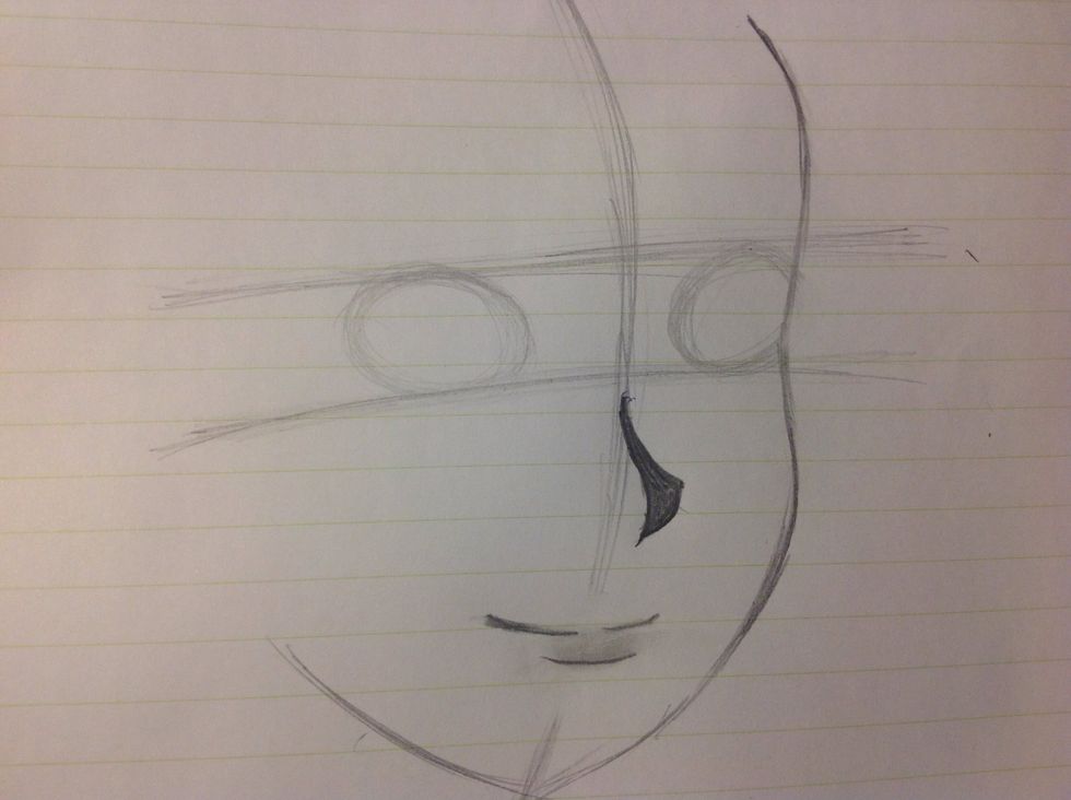 Then, draw two ovals, right on the borders of the guidelines.