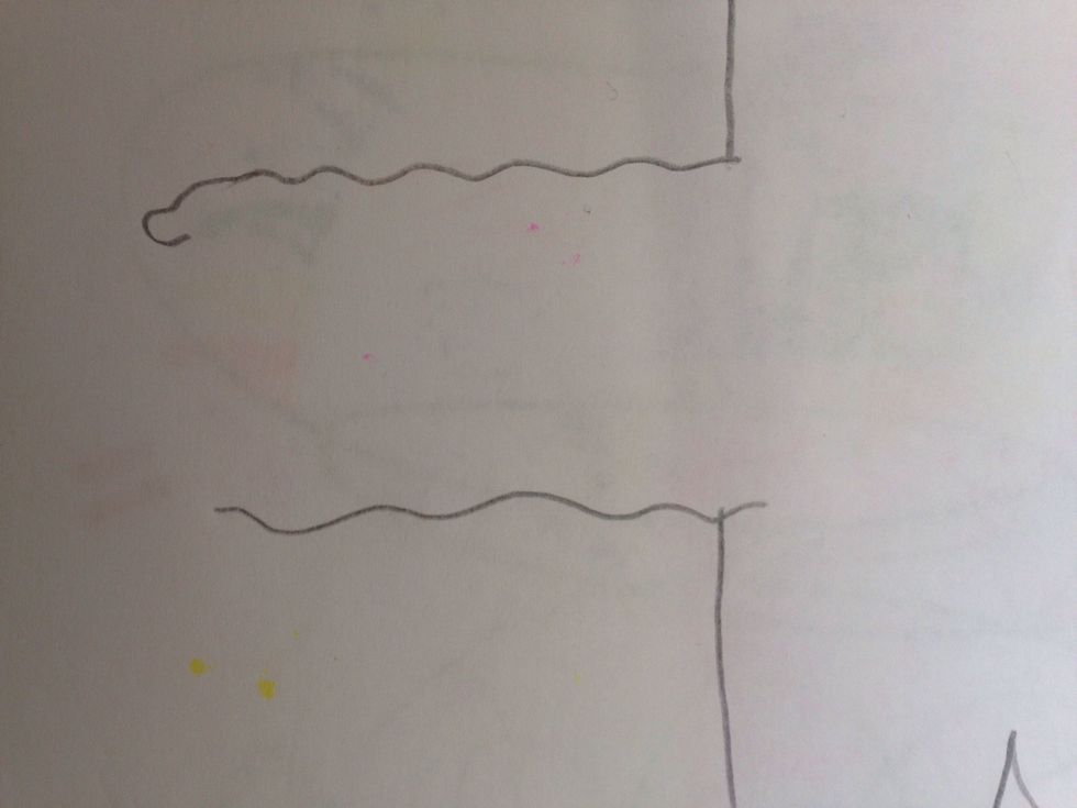 Then draw two wavy lines coming down from each side