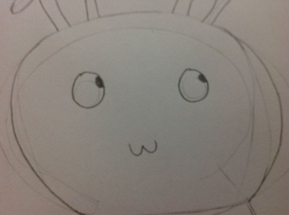 Then Draw your bunny eyes and put little dots in the corner.