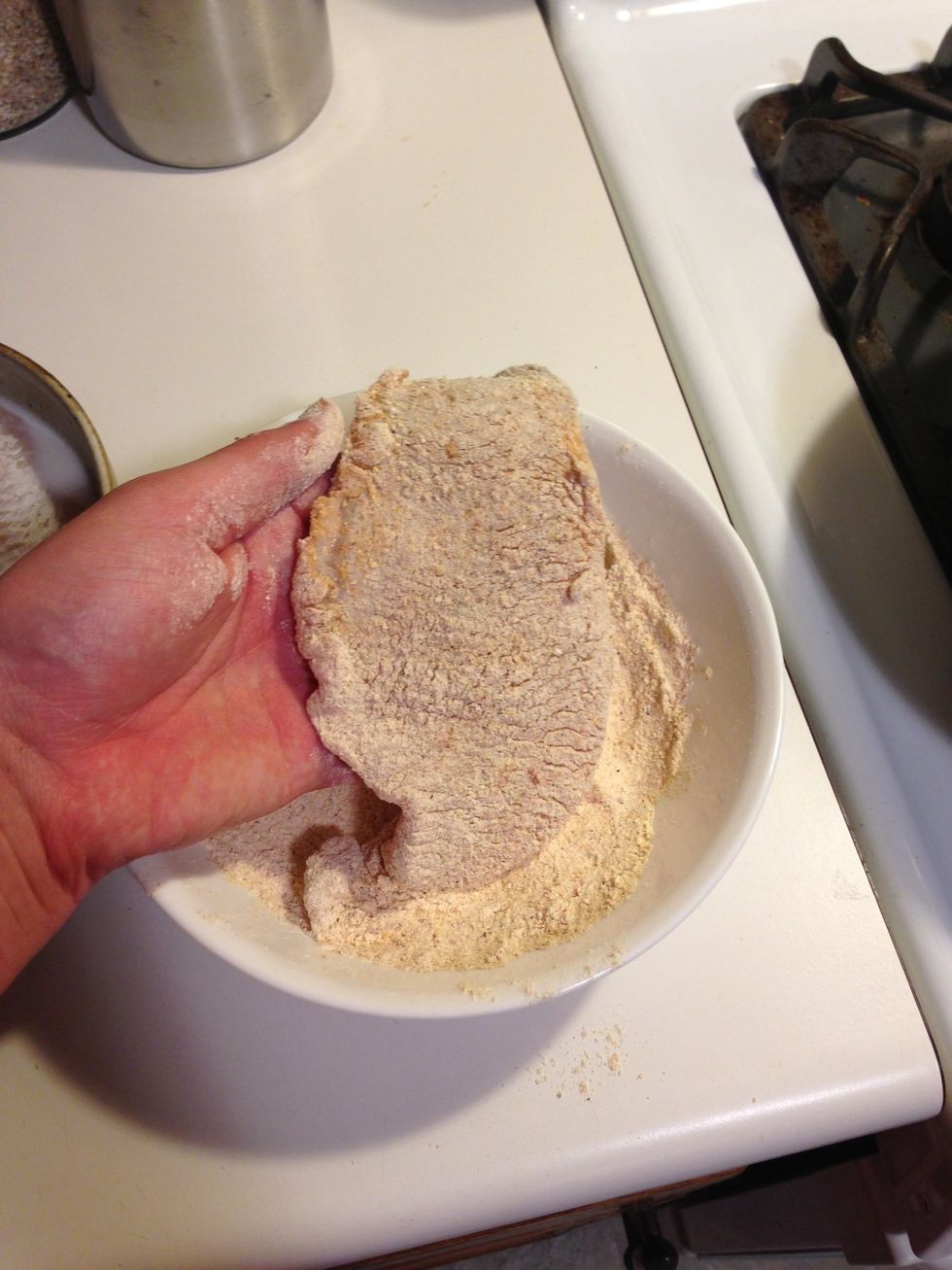 Then dredge through the mixture of dry ingredients. Coat the entire filet thoroughly. Make sure you get that flour everywhere! It'll pay off later.