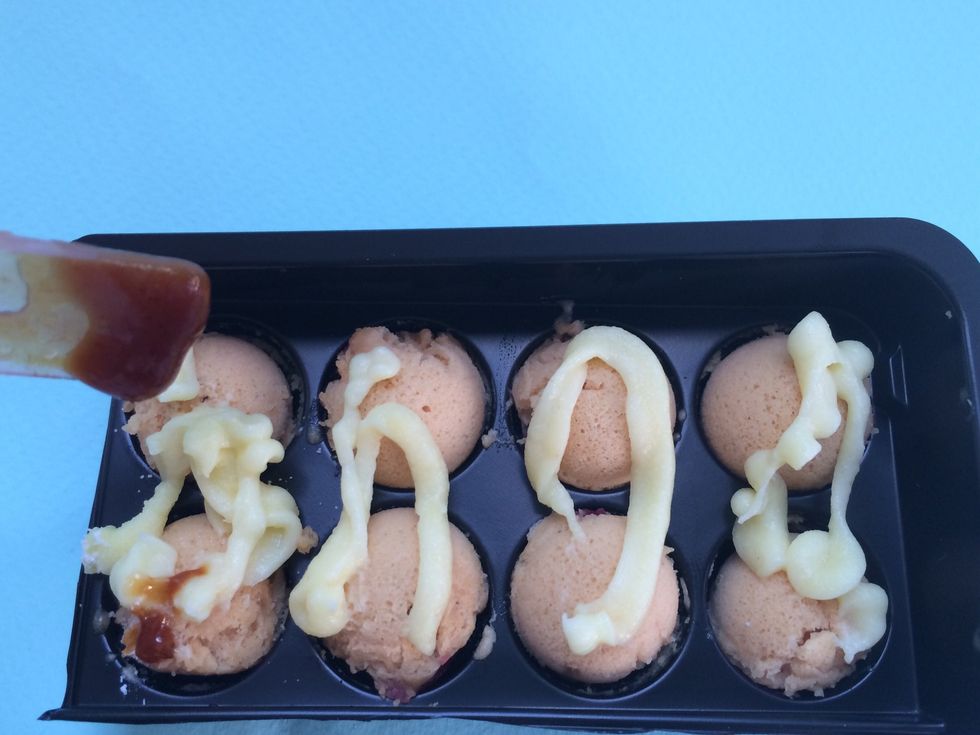 Then drizzle your Tonkatsu sauce on Takoyaki