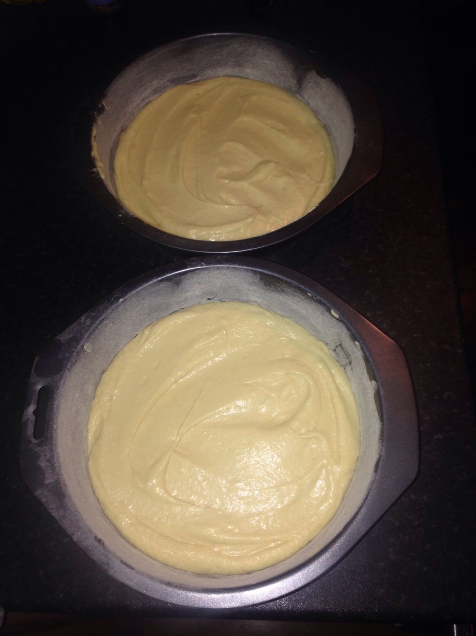 Then evenly separate the batter I between the two tins and spread evenly bake for 15-20 minutes until golden brown and there should be a gentle spring when cooked