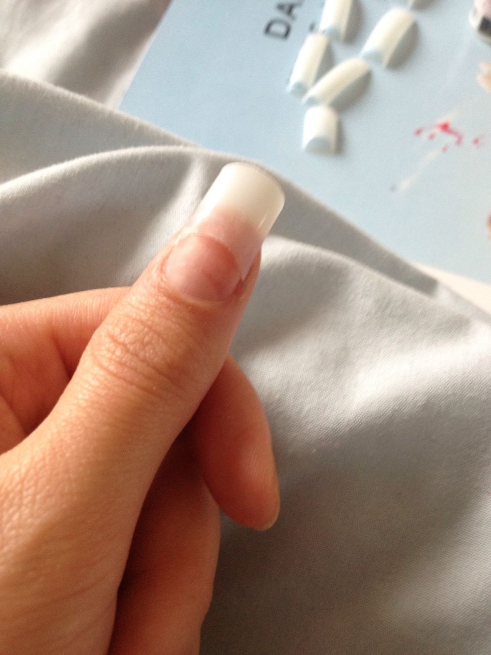 Then file down the ridge of the nail to create a smooth join to your natural nail, then buff to smooth