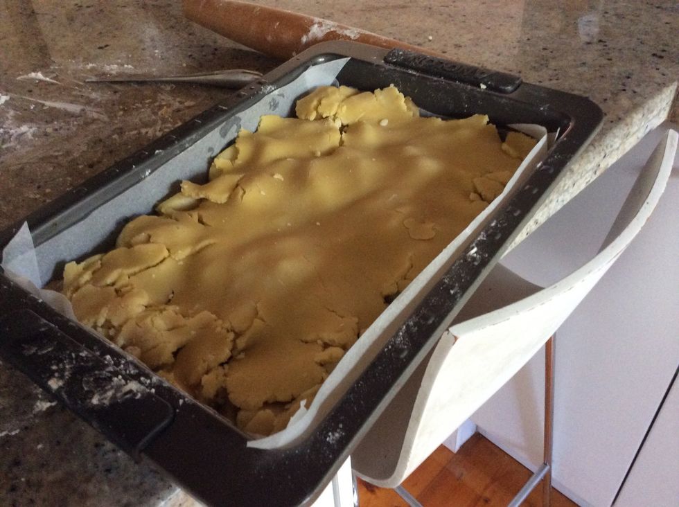 Then flatten the other ball over the top.