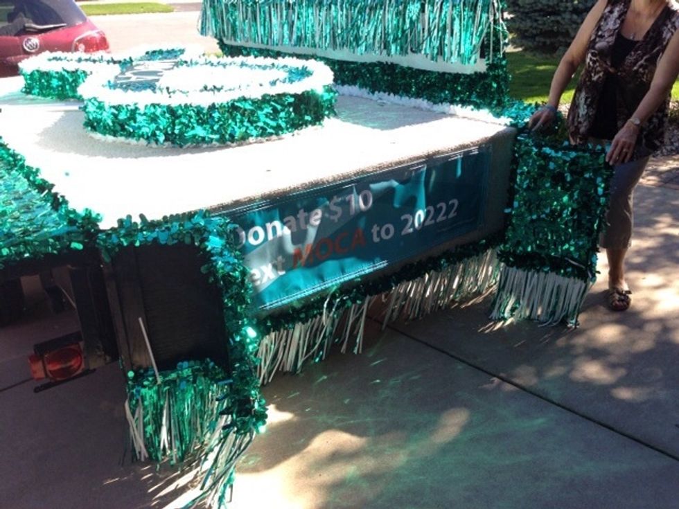 Then flip in the "wings" on the short sides of the float.