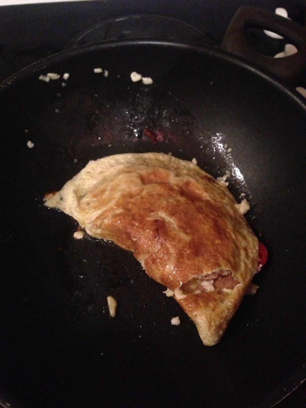 Then flip your omelette in 1/2(mines ripped\ud83d\ude3e) Cook like this for a couple of mins.