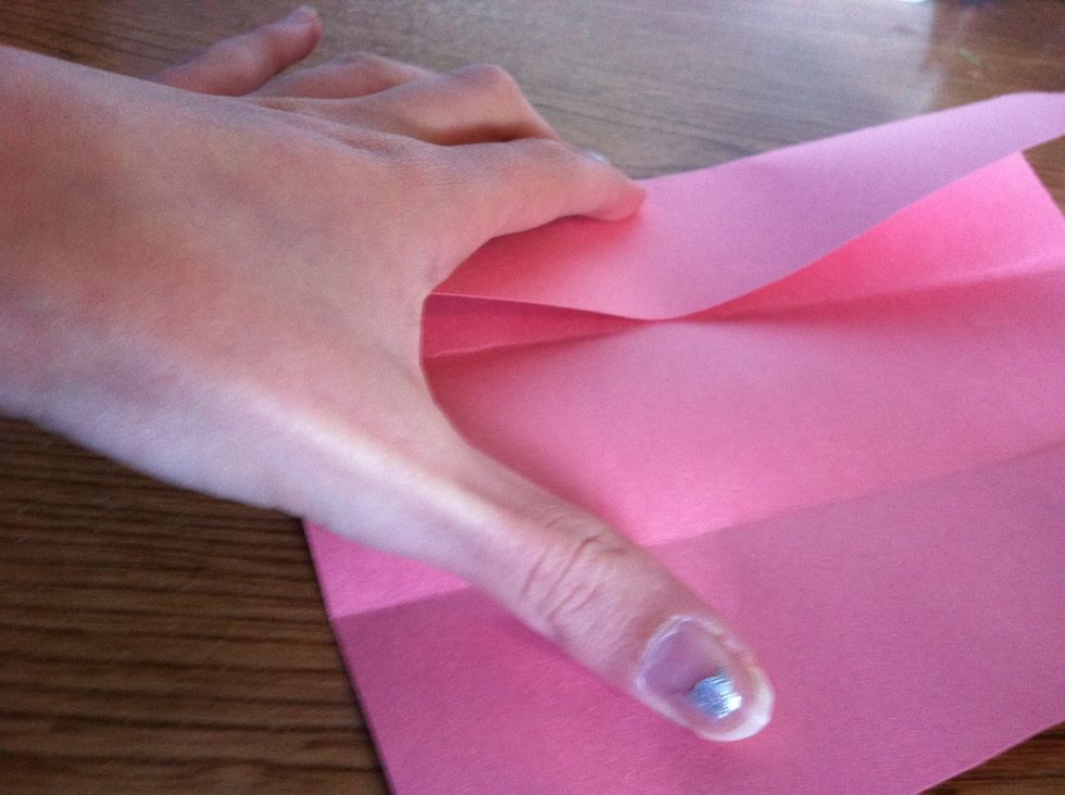 Then fold both sides of the half, in half.