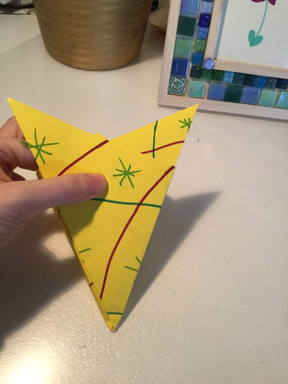 Then fold both sides to make an x