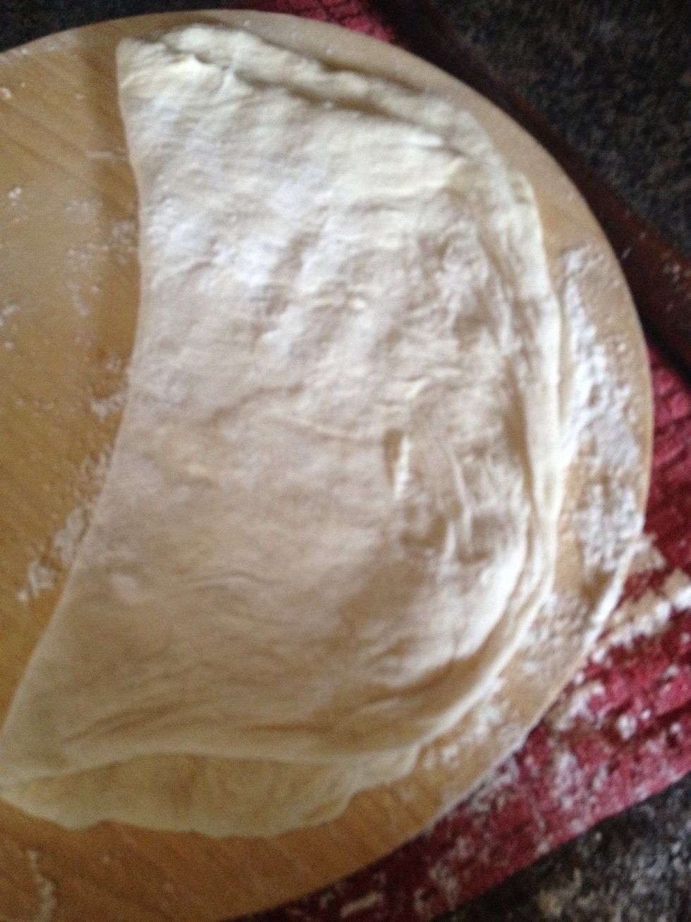 Then fold it in half make sure you got plenty of dusting