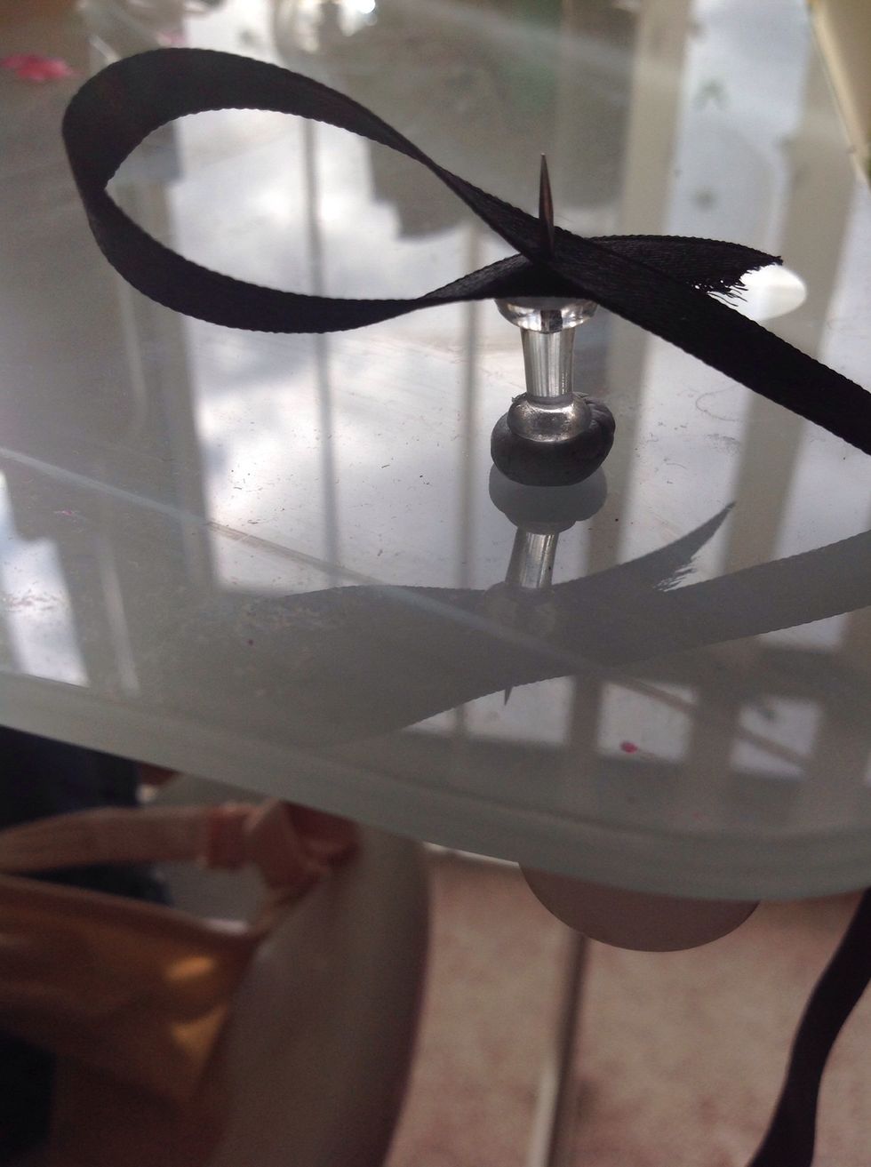 Then fold over itself and pin down