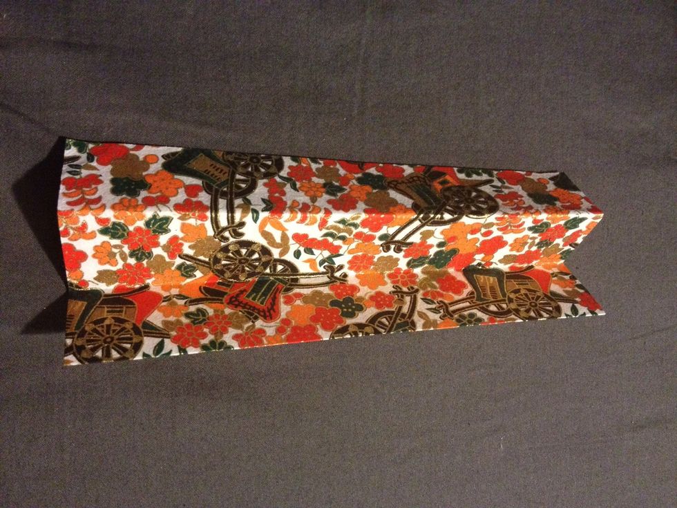 Then fold that into three equal sections and create guide lines