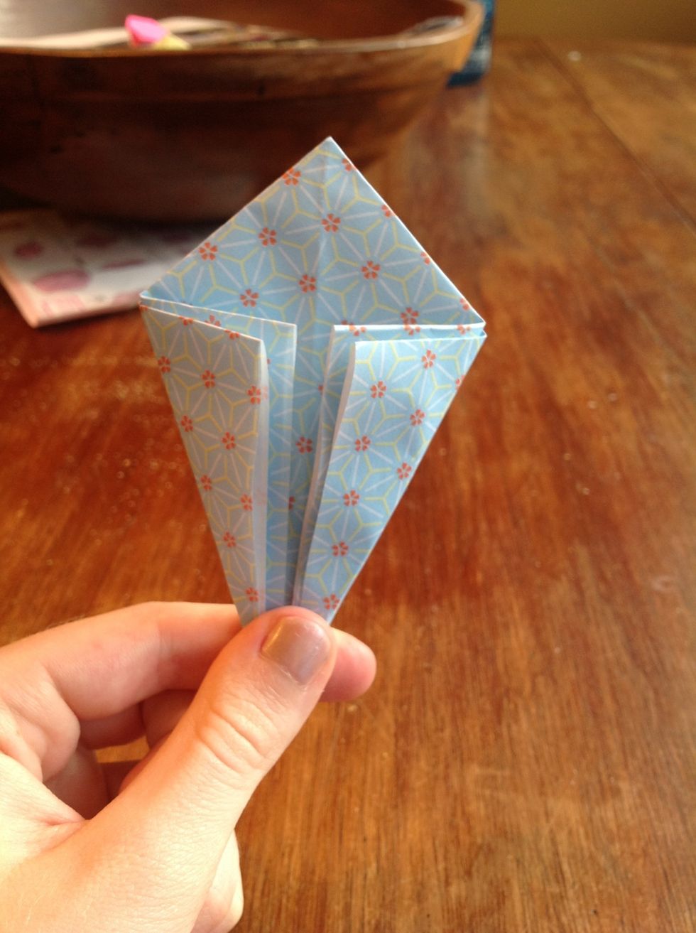 Then fold the edges along the crease