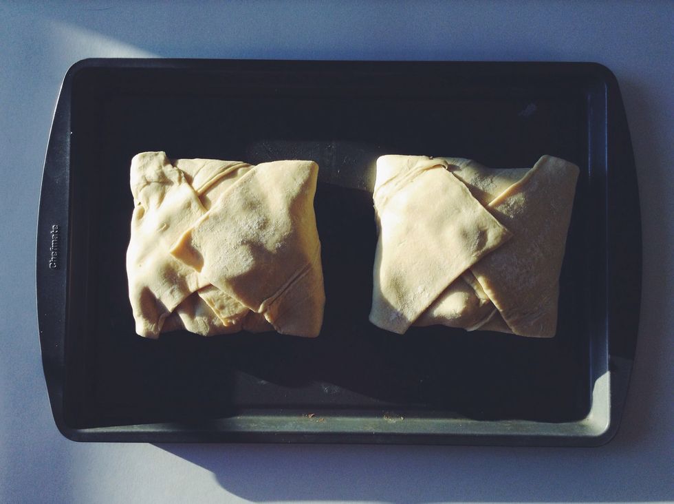 Then fold the last two corners to make a square. Finish your second pastry pocket and cook in the oven at 400 degrees F for 20 minutes! Brush the top with an egg wash to get a nice golden color.