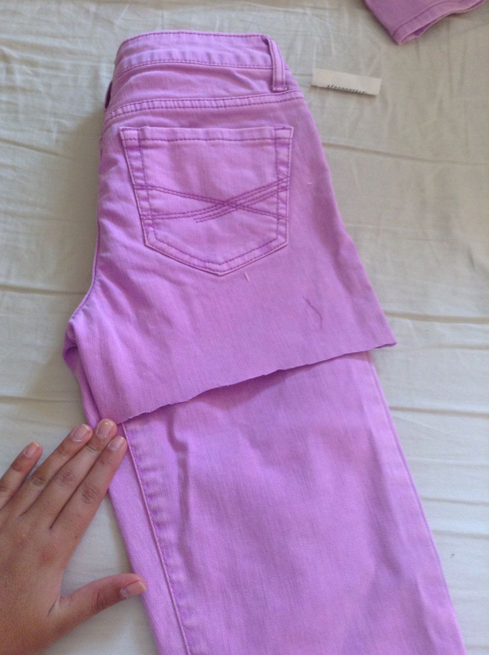 Then fold the one side you cut and folded it to the other side so you can see how long to cut the other side