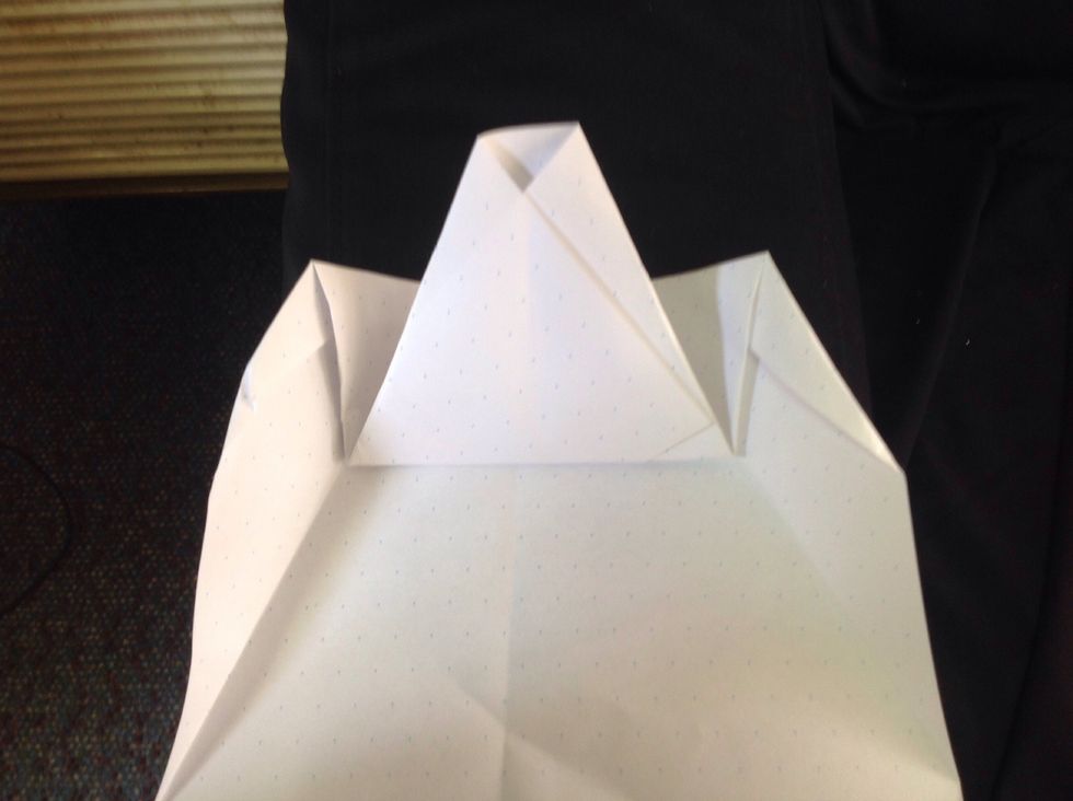 Then fold the parallelogram up but leave the base