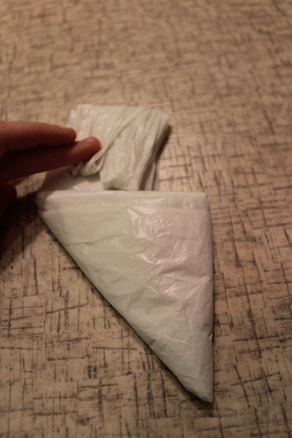 Then fold the rest in half