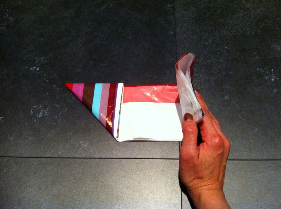 Then fold the right side to the middle...