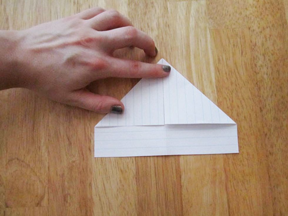 Then fold the top corners like the picture.