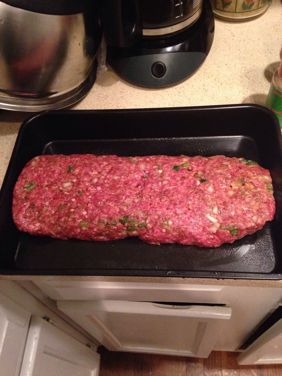 Then form meatloaf how you like into greased baking pan, put into oven covered for 25 mins on 375 ... It won't be done but we can start the gravy at that time ...