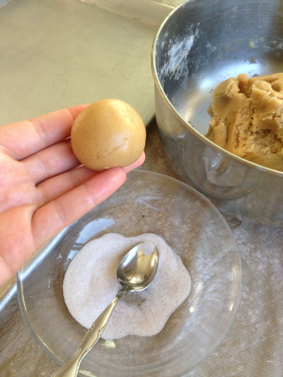 Then form smaller balls of dough about a inch and a half in diameter