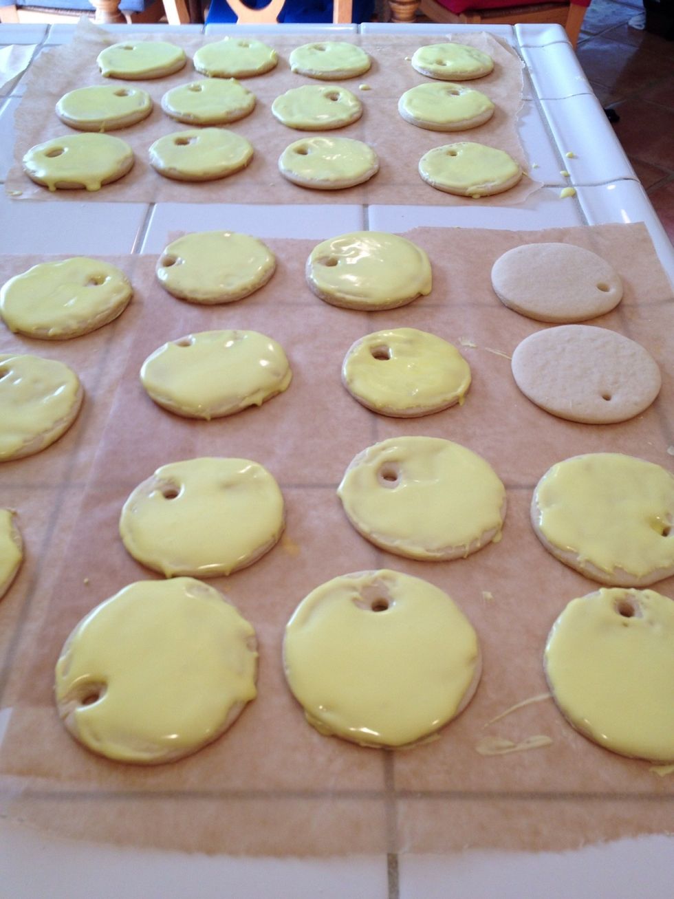 Then frost the cookies and let the frosting harden.