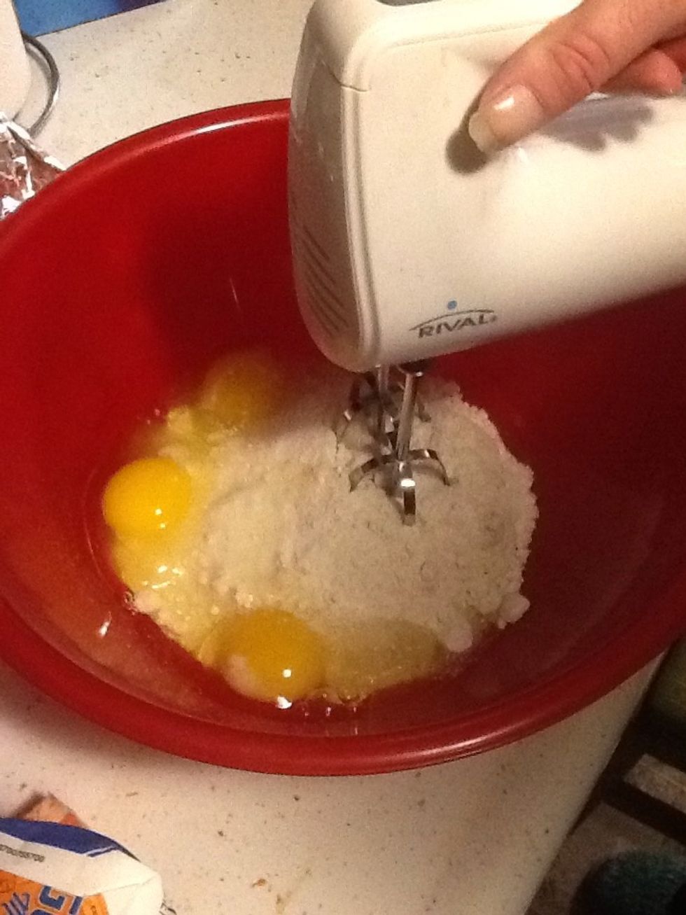 Then get a mixer and mix the flour and eggs up