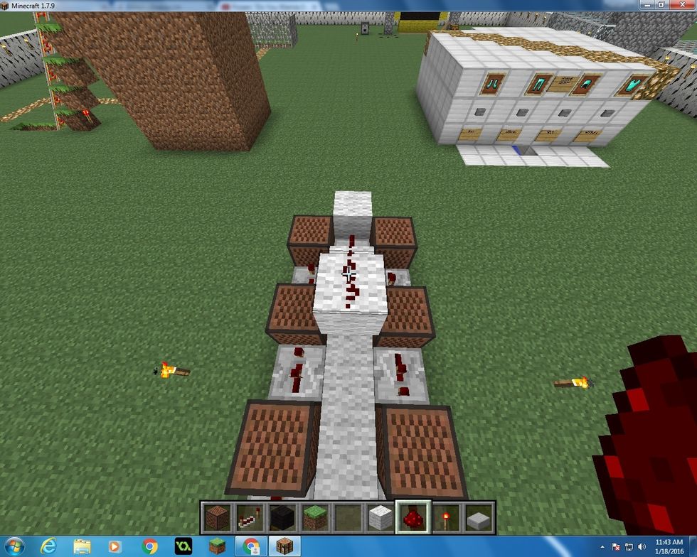 Then get another block of Wool and place it diagonally with the one you put down before. Take another Redstone and put it on top so it attaches with the one you put on before.