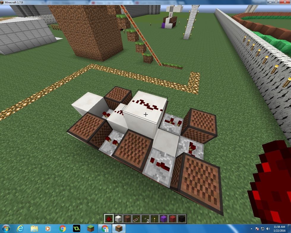 Then get another Quartz Block and place it another level up then the last one. And place your last Redstone on that block too.