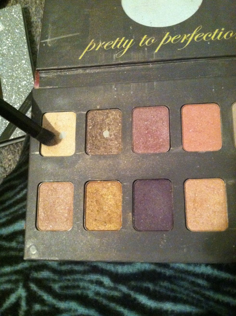 Then get any white ish color to put on the rest of your eye lid.