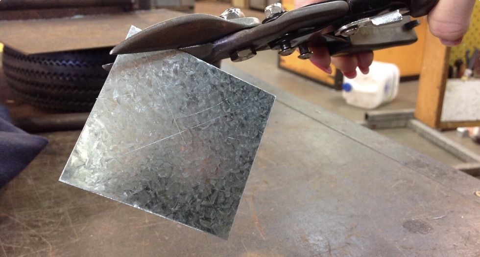 Then get the tin snips to cut out your circle