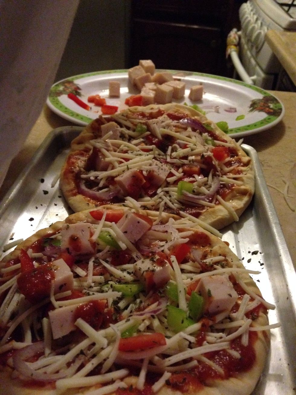 Then get them in the oven until the cheese has melted and the borders are golden.