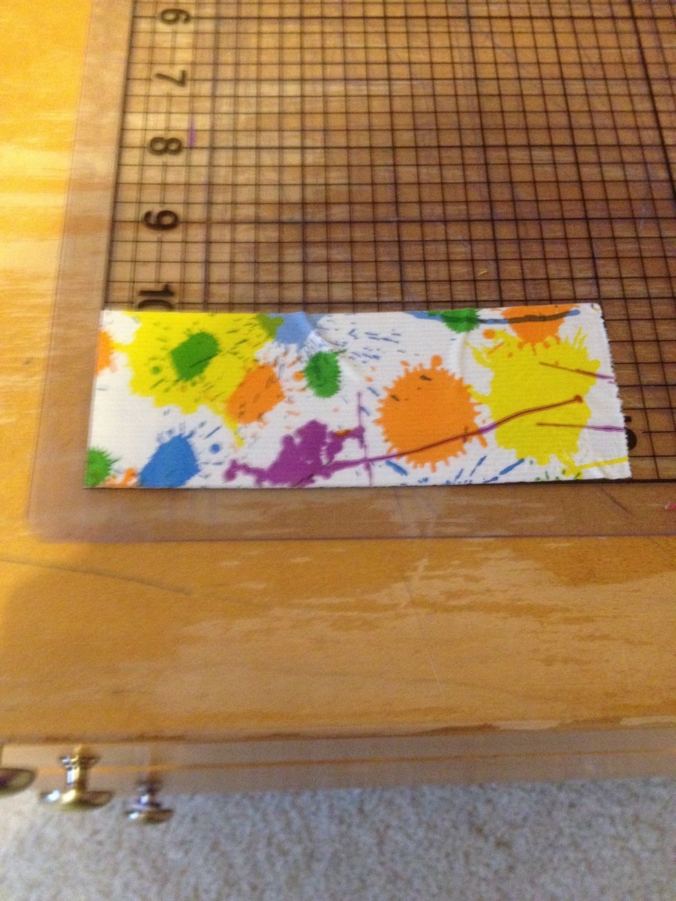 Then, get your pen and measure it. Cut a piece of tape that size