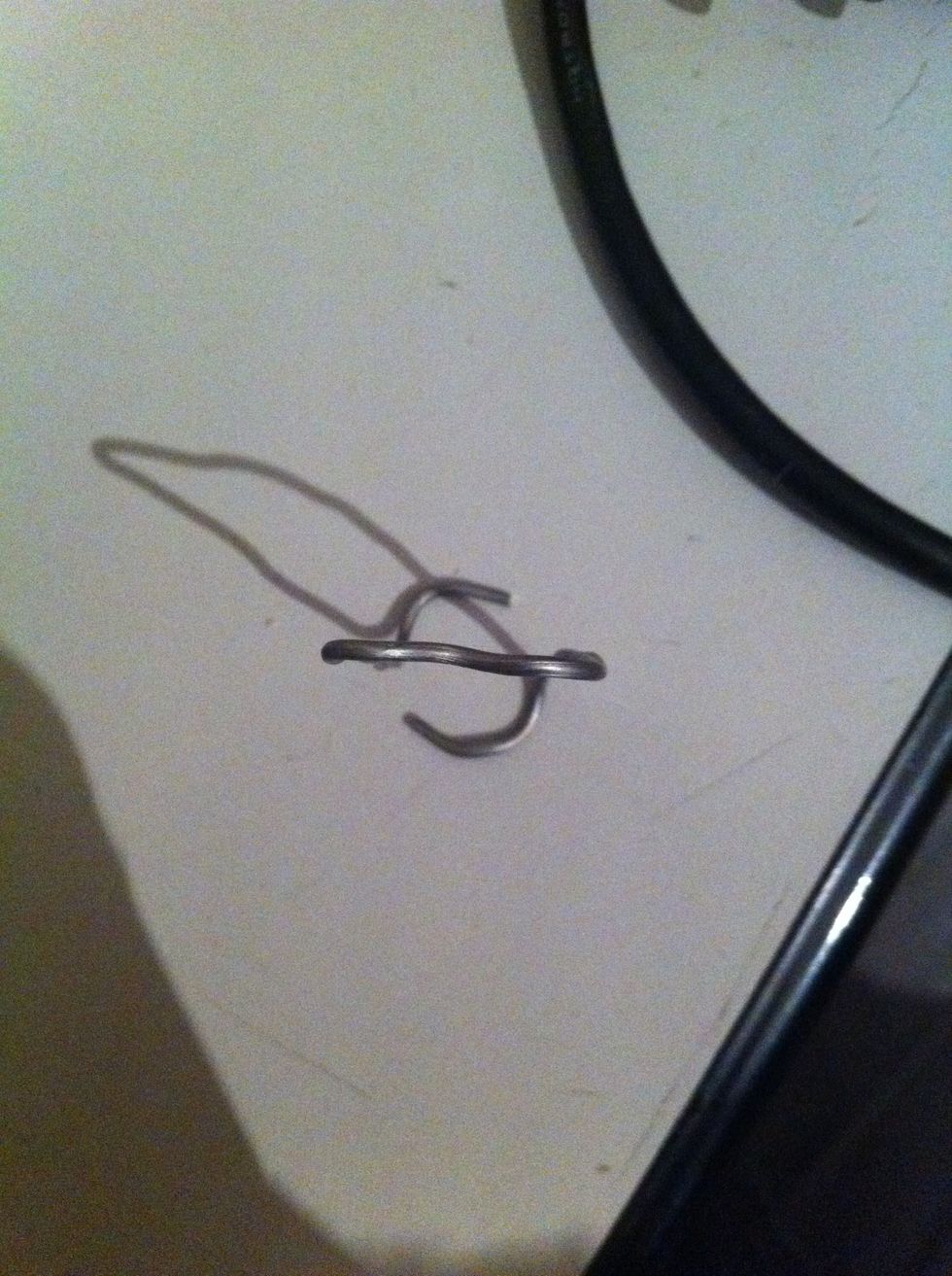 Then give them a slight curve. The circle formed by them should be about the size of you magnet.