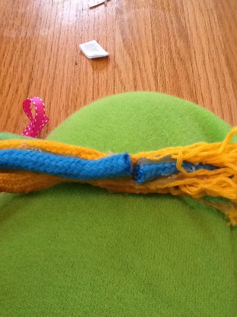 Then glue the very end of the lace to it like this