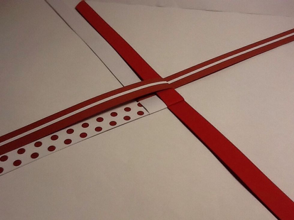 Then go anti clock wise and fold the top of each over the middle