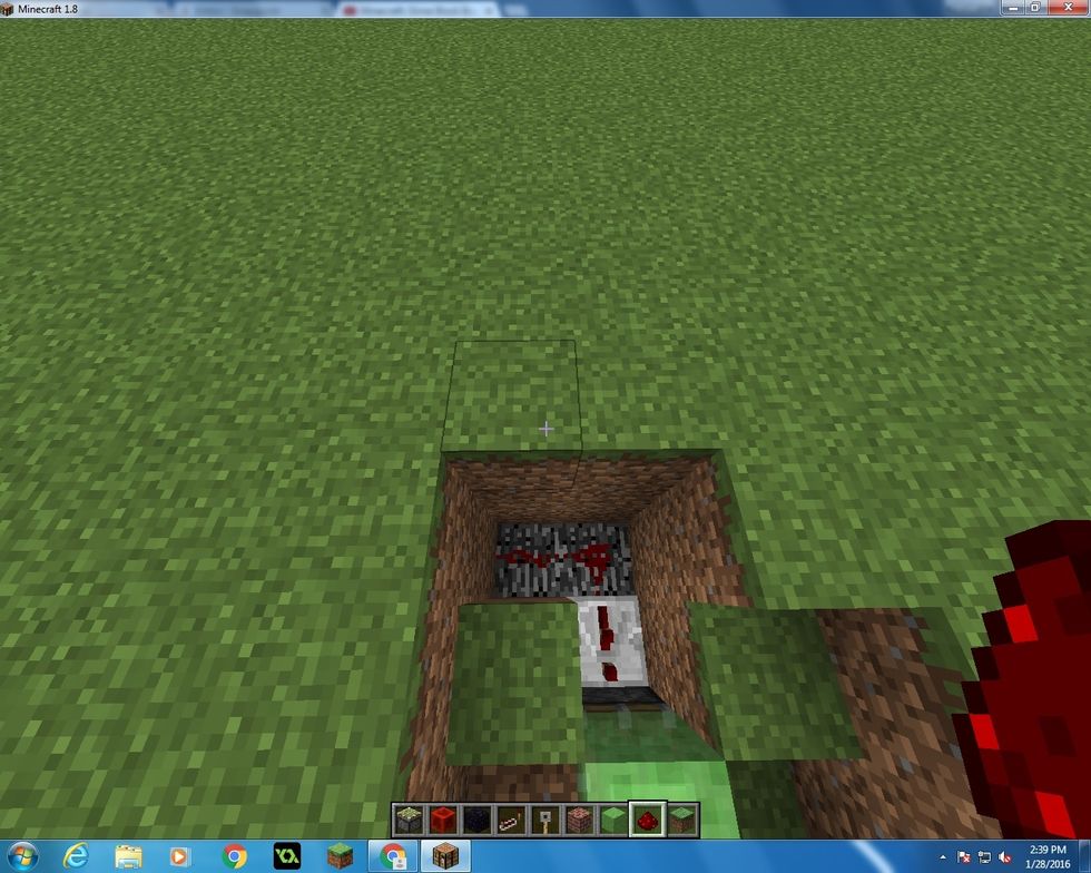 Then go behind your Repeater and dig 2 blocks down and 2 blocks wide like this.^^Next after you dig, place down your 2 Redstone. Thy should connect to the Repeater.