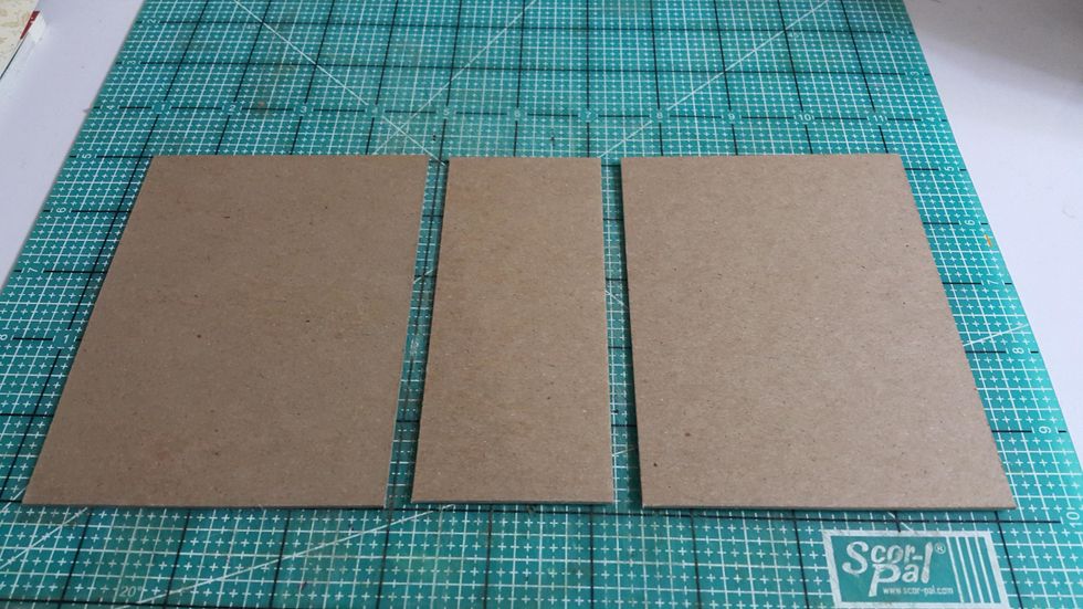 Then go to the middle hole of 2 chipboard mini albums, ready chipboard for the shorter one with 5"x3-5/8"(2pcs) and 5"x2"(1pc), then the taller one with 6"x3-5/8"(2pcs) and 6"x1-1/2"(1pc)
